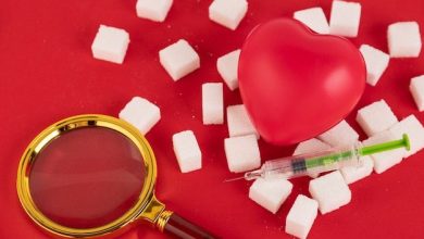 broken-heart-made-from-sugar-cubes-syringe-red-background-diabetes-concept-view-from-create-space_297535-2180-9755697