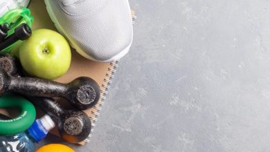 healthy-lifestyle-concept-health-diary-sneakers-water-dumbbells-with-green-apple_168171-192-5426104